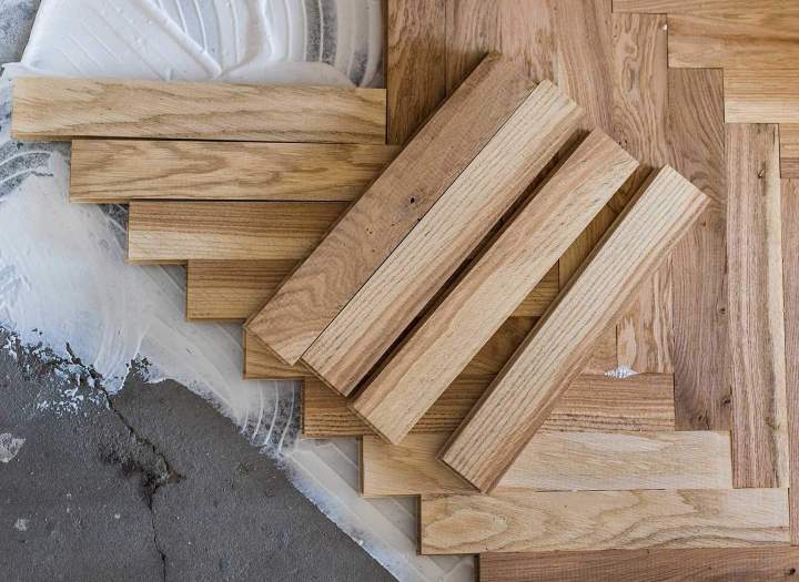 Installation de parquets massifs, contrecollés ou stratifiés.